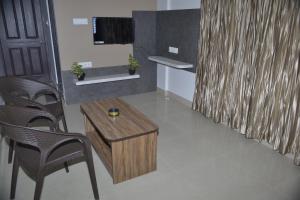 TV a/nebo společenská místnost v ubytování Hotel Saarang Forever