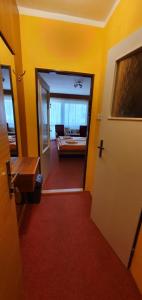 Postel nebo postele na pokoji v ubytování Hotel Poprad