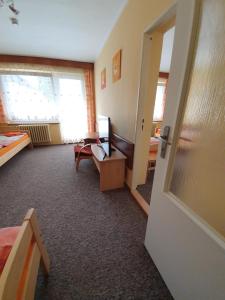 Postel nebo postele na pokoji v ubytování Hotel Poprad