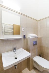 Kúpeľňa v ubytovaní Domus Peregrini Apartmanok