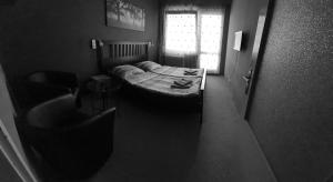 Postel nebo postele na pokoji v ubytování Hotel Poprad