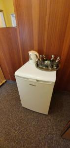 Příslušenství pro přípravu čaje a kávy v ubytování Hotel Poprad