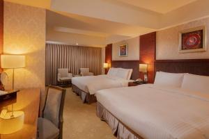 Postel nebo postele na pokoji v ubytování Arsma Hotel