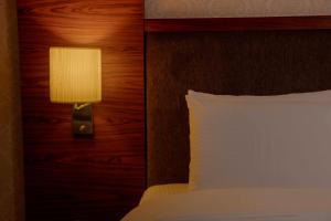 Postel nebo postele na pokoji v ubytování Arsma Hotel