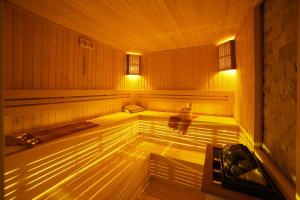 an empty sauna with lights on the inside of it at Great Fortune Design Hotel & Spa in Istanbul