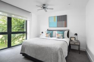 Q Square by Supercity Aparthotels客房内的一张或多张床位