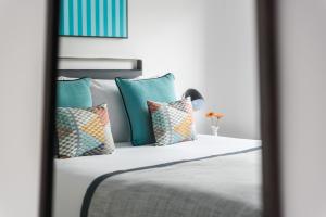 Q Square by Supercity Aparthotels客房内的一张或多张床位