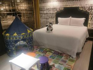 Letto o letti in una camera di 浪琴Motel文創旅館