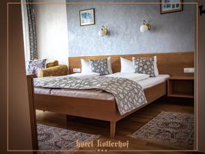 Postel nebo postele na pokoji v ubytování Hotel Kollerhof
