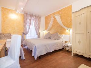 a bedroom with two beds and a window at Hotel Marina in Monterosso al Mare