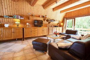Posezení v ubytování Das DÜNENHAUS + 33 fotografií
