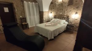 Postel nebo postele na pokoji v ubytování Apartamentos Rurales La Casa de Luis