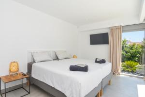 Posteľ alebo postele v izbe v ubytovaní Graham Holiday Rentals - Les Bassetes