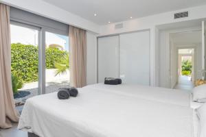 Posteľ alebo postele v izbe v ubytovaní Graham Holiday Rentals - Les Bassetes