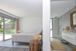 Posteľ alebo postele v izbe v ubytovaní Graham Holiday Rentals - Les Bassetes