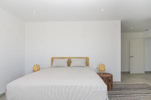 Posteľ alebo postele v izbe v ubytovaní Graham Holiday Rentals - Les Bassetes