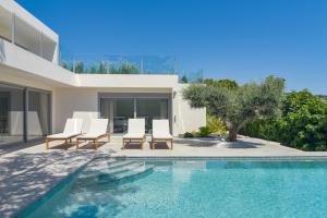 Bazén v ubytovaní Graham Holiday Rentals - Les Bassetes alebo v jeho blízkosti
