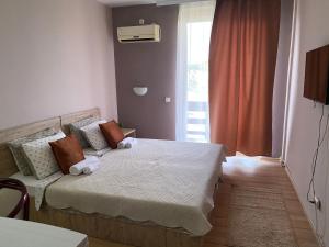 Postel nebo postele na pokoji v ubytování Hotel Park