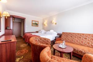 Posteľ alebo postele v izbe v ubytovaní Hotel Gołębiewski Białystok
