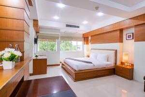Katil atau katil-katil dalam bilik di Sirin Hotel & Resident