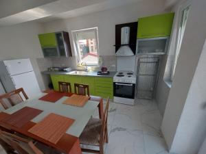 Køkken eller tekøkken på XXL APARTMENTS CiTY CENTAR 1