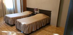 Letto o letti in una camera di Ruzan hotel
