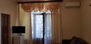 TV o dispositivi per l'intrattenimento presso Ruzan hotel