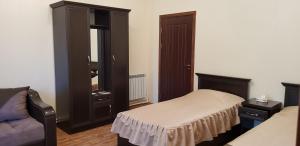 Letto o letti in una camera di Ruzan hotel