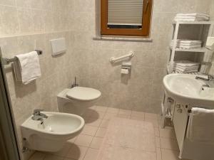 Kúpeľňa v ubytovaní Apartments Oberhollenzer
