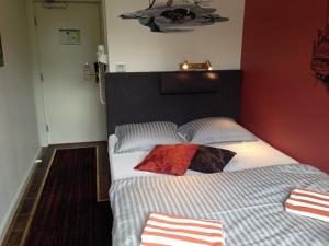 Cama o camas de una habitación en Stockholm Classic Hotell