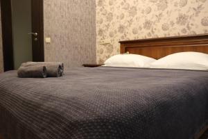 Postel nebo postele na pokoji v ubytování Bogdanov Yar Hotel