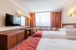 Posteľ alebo postele v izbe v ubytovaní Hotel Gołębiewski Białystok