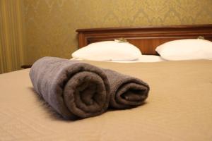 Postel nebo postele na pokoji v ubytování Bogdanov Yar Hotel