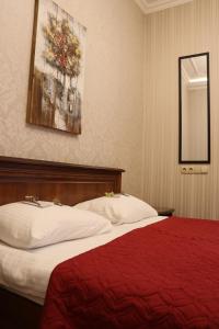 Postel nebo postele na pokoji v ubytování Bogdanov Yar Hotel