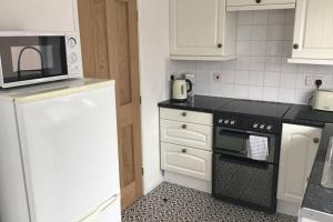 Köök või kööginurk majutusasutuses Beverley Ffrith beach Prestatyn