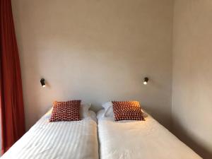 Voodi või voodid majutusasutuse Groot Noordhof toas