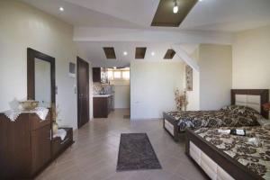 A bed or beds in a room at Studios Xanthipi