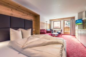 Postel nebo postele na pokoji v ubytování Hotel Restaurant Claudia - inklusive SUPER SOMMER CARD