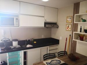 Kuchyň nebo kuchyňský kout v ubytování Praia Carneiros Flat Hotel