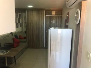 Kuchyň nebo kuchyňský kout v ubytování Praia Carneiros Flat Hotel