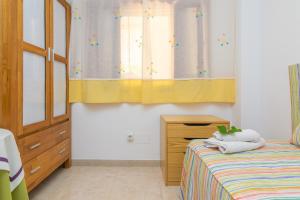 Ein Bett oder Betten in einem Zimmer der Unterkunft Bella