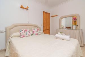 Ein Bett oder Betten in einem Zimmer der Unterkunft Bella