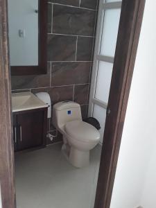 Phòng tắm tại Hotel Playa Blanca - San Antero