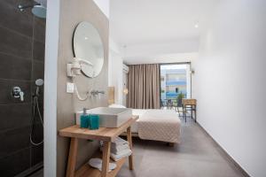Posteľ alebo postele v izbe v ubytovaní Moscha Hotel