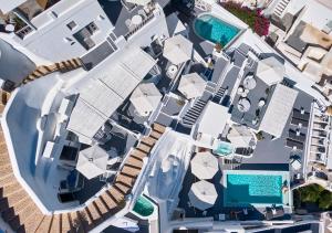 an aerial view of a resort with a swimming pool at Filotera Suites in Oia
