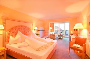 Łóżko lub łóżka w pokoju w obiekcie Hotel Sägerhof