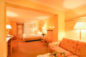 Łóżko lub łóżka w pokoju w obiekcie Hotel Sägerhof