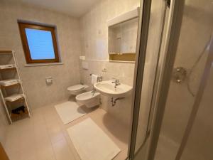 Kúpeľňa v ubytovaní Apartments Oberhollenzer + 37 fotografií