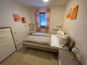 Posteľ alebo postele v izbe v ubytovaní Apartments Oberhollenzer