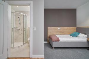 Kúpeľňa v ubytovaní Apartamenty Queen + 18 fotografií